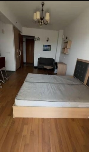 Bedroom in Studio Apartment at Nimbus The Golden Palm, Sector 168 – for Rent