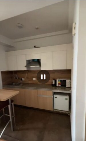 Kitchen in Studio Apartment at Nimbus The Golden Palm, Sector 168 – for Rent
