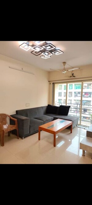 Living Room in 2 BHK Apartment at Arsiwala Essar Apex, Virar West – for Rent