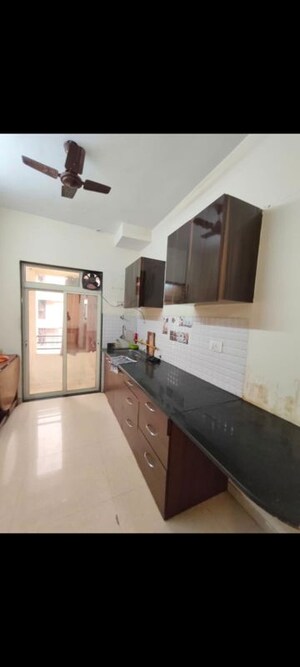 Kitchen in 2 BHK Apartment at Arsiwala Essar Apex, Virar West – for Rent
