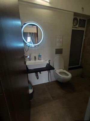 Bathroom in 2 BHK Apartment at Omkar Signet, Malad East – for Rent