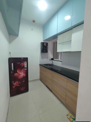 Kitchen in 2 BHK Apartment at Omkar Signet, Malad East – for Rent