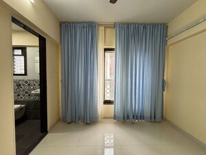 Room in 2 BHK Apartment at Parivar CHS Santacruz West, Santacruz West – for Rent