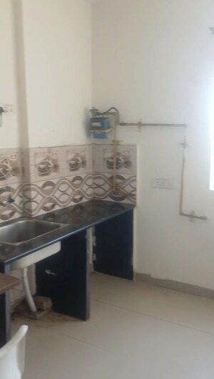 Kitchen in 1 BHK Apartment at Urbtech Xaviers, Sector 168 – for Rent
