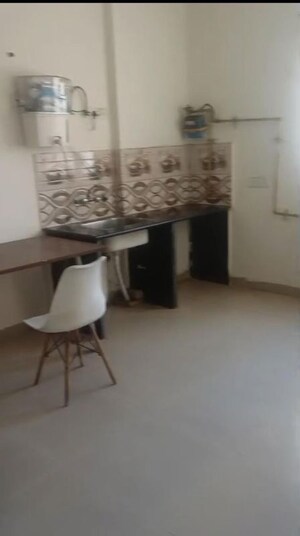 Team Area in 1 BHK Apartment at Urbtech Xaviers, Sector 168 – for Rent