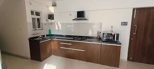 Kitchen in 3 BHK Apartment at Gera World of Joy, Kharadi – for Rent