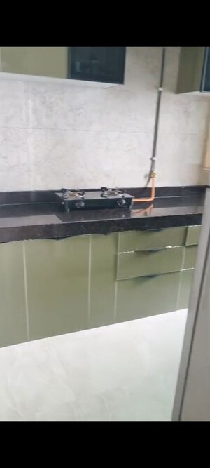 Kitchen in 1 BHK Apartment at Mantri Park, Goregaon East – for Rent