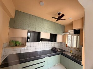 Kitchen in 2 BHK Apartment at Tulsiani Urban Woods, Sushant Golf City – for Rent