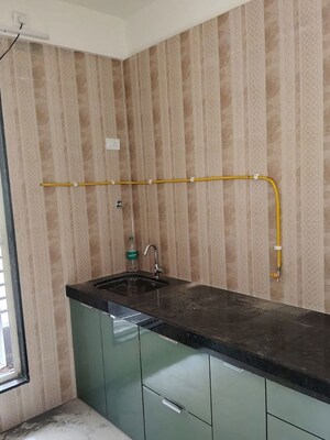 Kitchen in 1 BHK Apartment at Piramal Vaikunth, Balkum Pada – for Rent