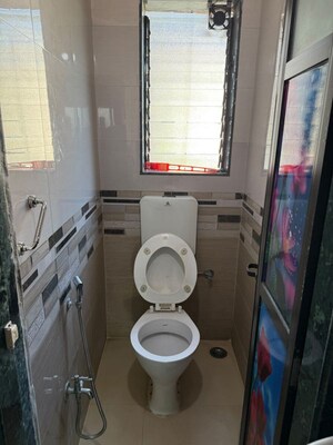 Bathroom in 1 BHK Apartment at Puranik City Reserva, Ghodbunder Road – for Rent