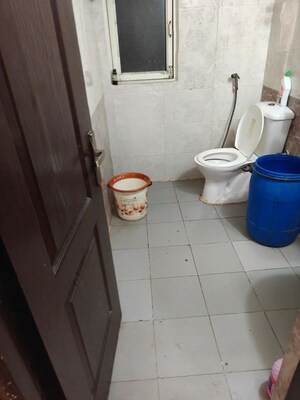 Bathroom in 2 BHK Apartment at Aims Golf City, Sector 75 – for Rent