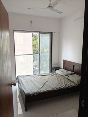 Bedroom in 1 BHK Apartment at Neelyog Aashiyana, Kandivali West – for Rent