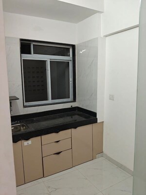 Kitchen in 1 BHK Apartment at Neelyog Aashiyana, Kandivali West – for Rent