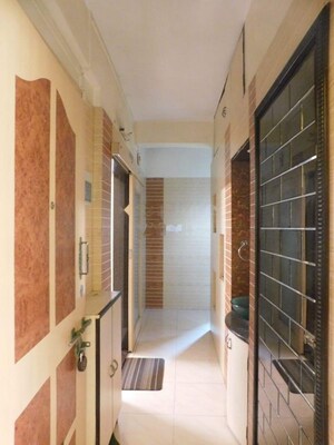 Building Lobby in 2 BHK Apartment at Nilanjana CHS, Malad West – for Rent