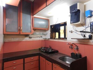Kitchen in 2 BHK Apartment at Nilanjana CHS, Malad West – for Rent