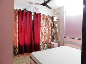Bedroom in 2 BHK Apartment at Nilanjana CHS, Malad West – for Rent