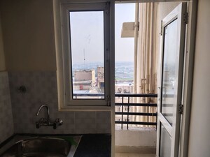 Kitchen in 2.5 BHK Apartment at Today Ridge Residency, Sector 135 – for Rent