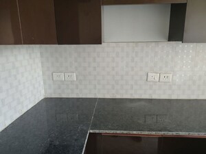 Kitchen in 2.5 BHK Apartment at Today Ridge Residency, Sector 135 – for Rent