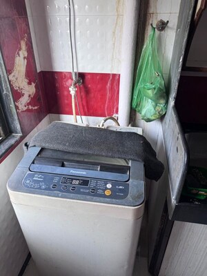 Laundry Area in 2 BHK Apartment at Arpan Darpan CHS, Goregaon East – for Rent
