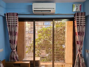 Bedroom in 2 BHK Apartment at Midcity The Chakravarti Ashok CHSL, Andheri East – for Rent