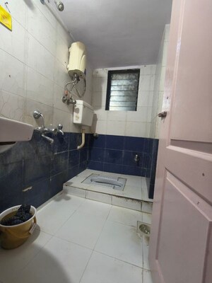 Bathroom in 1 BHK Apartment at Mehta Amrut Angan Phase I, Kalwa – for Rent