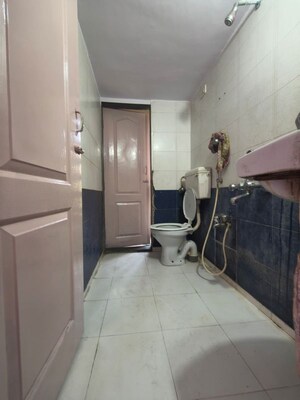 Bathroom in 1 BHK Apartment at Mehta Amrut Angan Phase I, Kalwa – for Rent