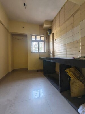 Kitchen in 2 BHK Apartment at Dosti Group Maitri Vatika, Kalwa – for Rent