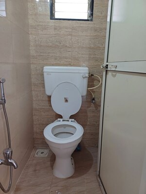 Bathroom in 1 BHK Apartment at Chamunda Residency, Ghansoli – for Rent