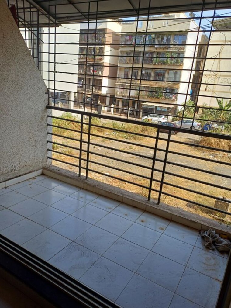 Balcony, chamunda-residency 1 Bedroom 674 Sq.Ft. Apartment In Ghansoli Navi Mumbai 10784390