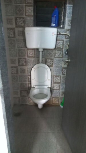 Bathroom in 2 BHK Apartment at Arihant City, Bhadwad Gaon – for Rent