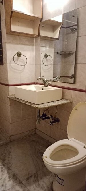 Bathroom in 3 BHK Builder Floor at Greater Kailash I – for Rent