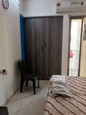 Bedroom in 2 BHK Apartment at Mahalakshmi Towers, Andheri West – for Rent