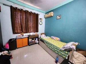 Bedroom in 2 BHK Apartment at New Mhada Towers, Andheri West – for Rent