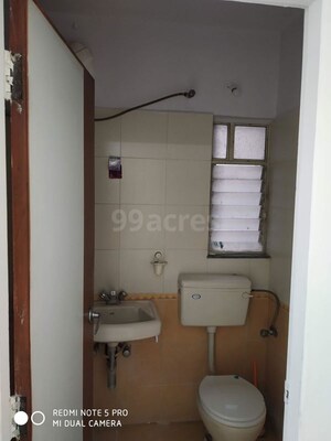 Bathroom in 2 BHK Apartment at Kumar Primavera, Wadgaon Sheri – for Rent