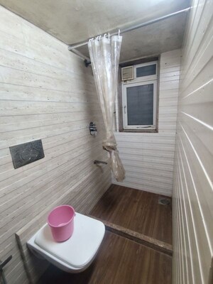 Bathroom in 2 BHK Apartment at Mota Mahal Apartment, Andheri West – for Rent