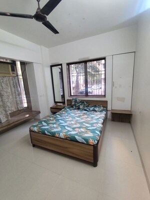 Bedroom in 2 BHK Apartment at Mota Mahal Apartment, Andheri West – for Rent