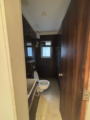 Bathroom in 2 BHK Apartment at Mamta Apartment Andheri, Andheri West – for Rent