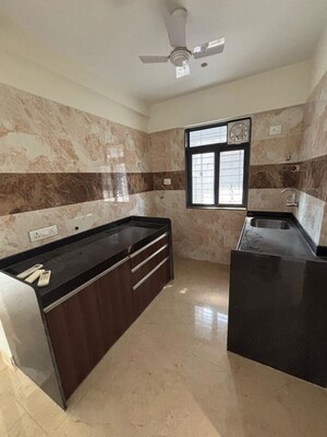 Kitchen in 2 BHK Apartment at Mamta Apartment Andheri, Andheri West – for Rent