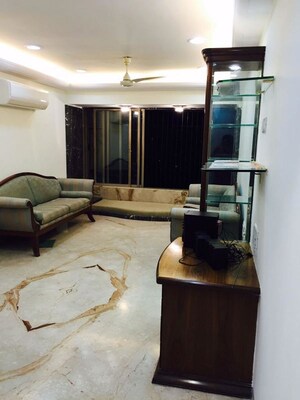Living Room in 2 BHK Apartment at Kanchan Ganga CHS Andheri, Andheri West – for Sale