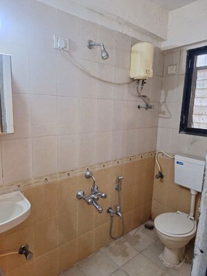 Bathroom in 2 BHK Apartment at The Hard Rock, Kharghar – for Rent