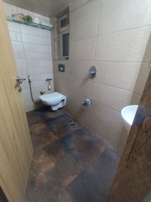 Bathroom in 2 BHK Apartment at Mota Mahal Apartment, Andheri West – for Rent