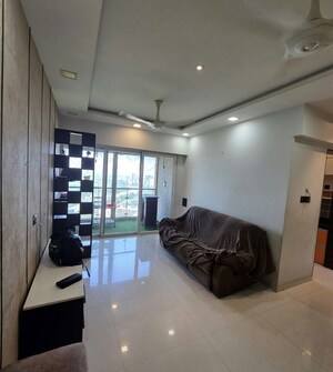 Living Room in 2 BHK Apartment at Rustomjee Azziano Wing K, Thane West – for Sale