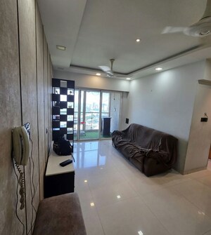 Living Room in 2 BHK Apartment at Rustomjee Azziano Wing K, Thane West – for Sale