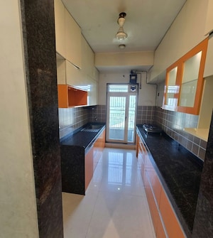 Kitchen in 2 BHK Apartment at Rustomjee Azziano Wing K, Thane West – for Sale