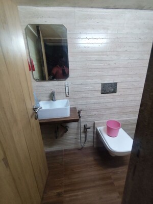 Bathroom in 2 BHK Apartment at New Mhada Towers, Andheri West – for Rent