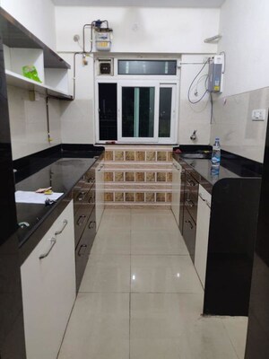 Kitchen in 2 BHK Apartment at Rustomjee Urbania Acura, Thane West – for Sale