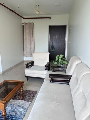Living Room in 2 BHK Apartment at Kalpataru Paramount, Kapur Bawdi – for Rent
