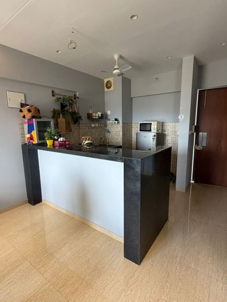 Kitchen, lodha-belmondo 1 Bedroom 711 Sq.Ft. Apartment In Gahunje Pune 10784606