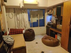 Living Room in 2 BHK Apartment at Neminath Luxeria, Andheri West – for Rent