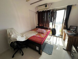 Living Room in 2 BHK Apartment at Neminath Luxeria, Andheri West – for Rent